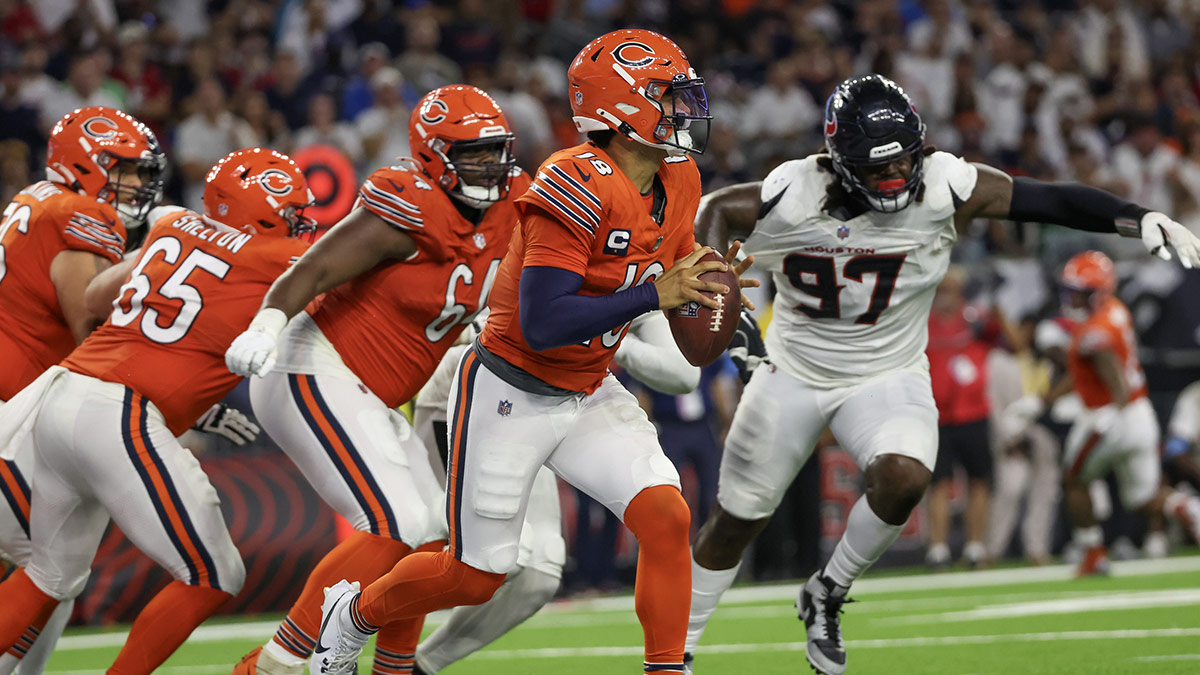 Chicago Bears quarterback Caleb Williams (18) scramble against the Houston Texans in the second half at NRG Stadium.