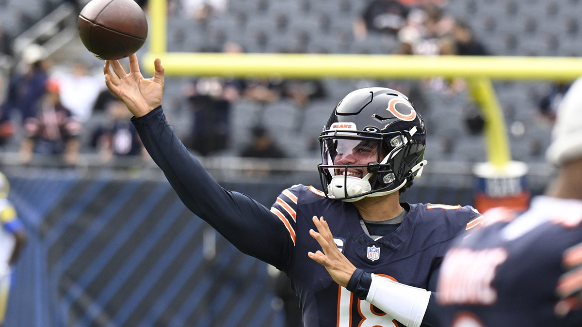 Chicago Bears quarterback Caleb Williams (18) warms up before the game against the Los Angeles Rams at Soldier Field.