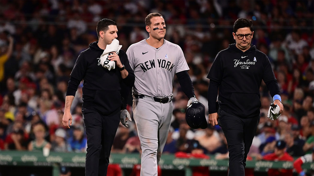 New York Yankees first baseman Anthony Rizzo (48) returns to the dugout after being injured at first base in the seventh inning at Fenway Park.