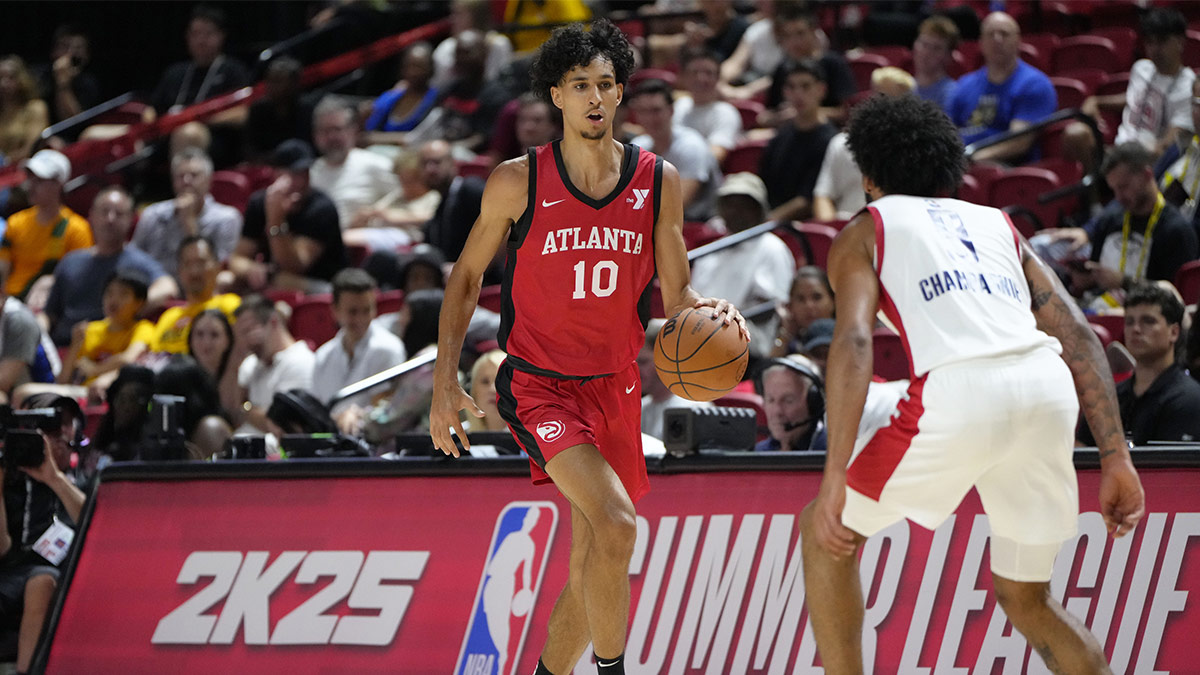 Atlanta Hawks forward Zaccharie Risacher (10) dribbles the ball against Washington Wizards forward Justin Champagnie (9) during the first half at Thomas & Mack Center.