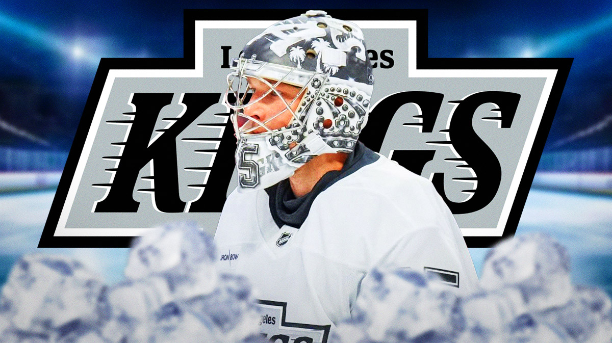 Darcy Kuemper looking stern, first aid kit, Los Angeles Kings logo, hockey rink in background