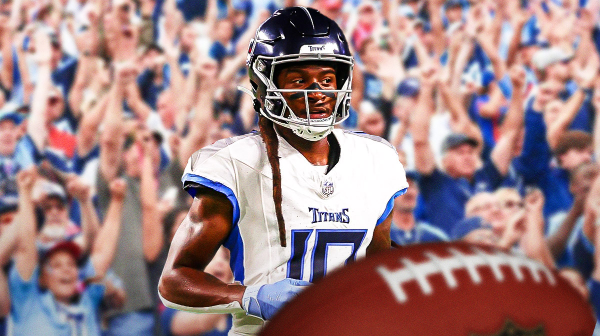 DeAndre Hopkins in Titans uniform with fans background.