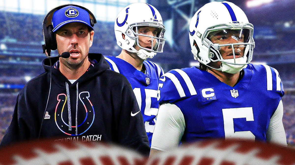 Colts coach Shane Steichen next to Joe Flacco looking at Anthony Richardson.