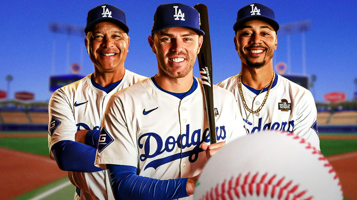 Los Angeles Dodgers star Freddie Freeman in the middle of Dave Roberts and Mookie Betts in front of Dodger Stadium.