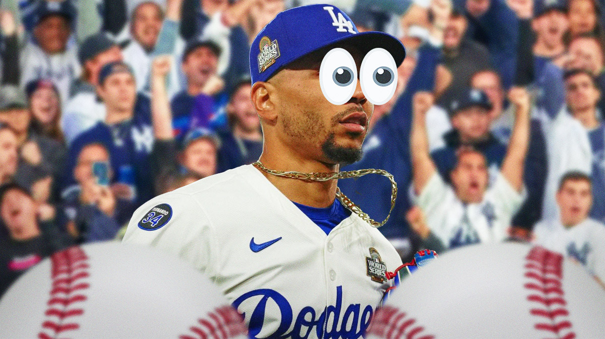 Dodgers star Mookie Betts with emoji eyes surrounded by Yankees fans