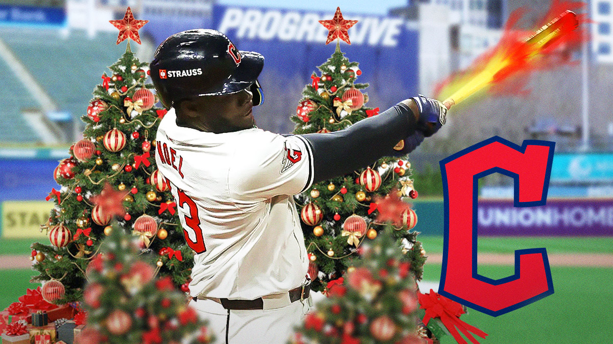Guardians Johnkensy Noel swinging a bat of fire in front of Christmas trees
