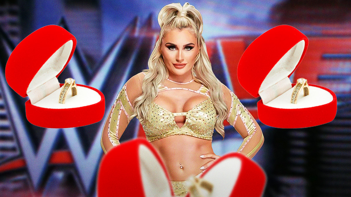 WWE star Tiffany Stratton with engagement rings around her after fan proposed to her at live event.