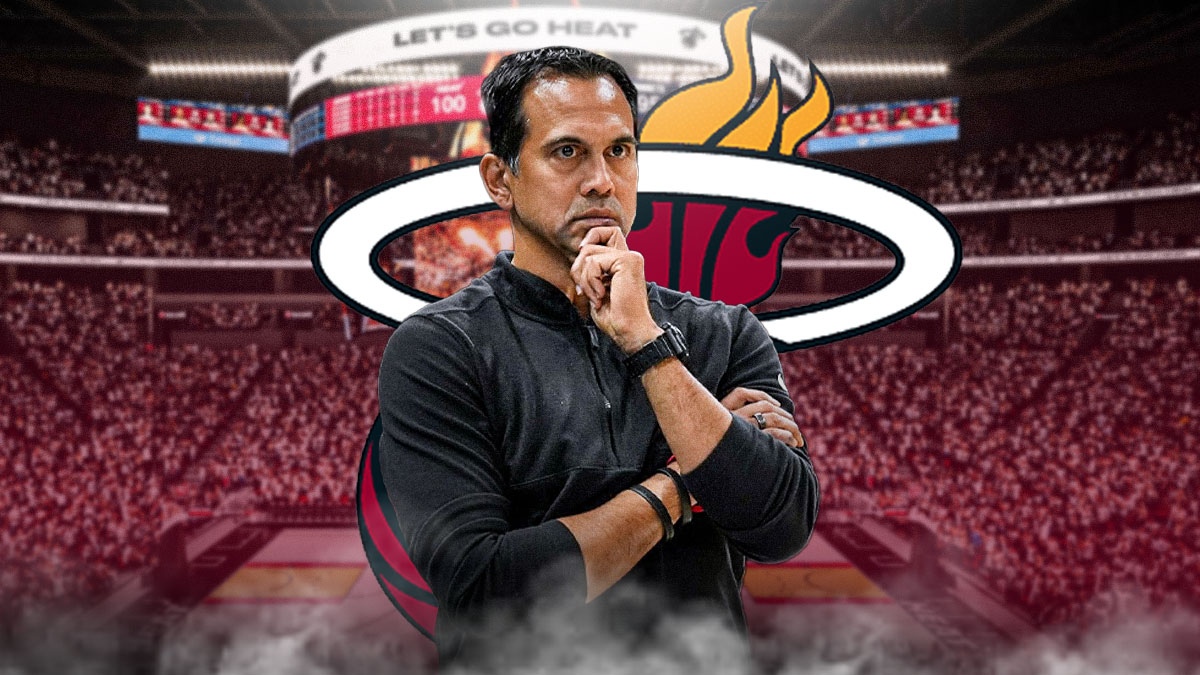Heat Erik Spoelstra with Miami Heat logo