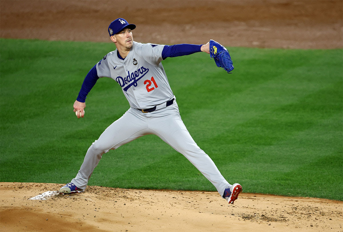 Los Angeles Dodgers pitcher Walker Buehler (21) throws during the first inning in game three of the 2024 MLB World Series against the New York Yankees at Yankee Stadium.