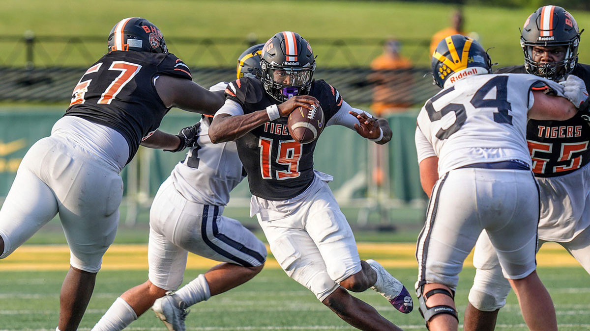 Belleville QB Bryce Underwood runs for yards against Clarkston during the 2024 Xenith Prep Kickoff Classic at Wayne State's Tom Adams Field