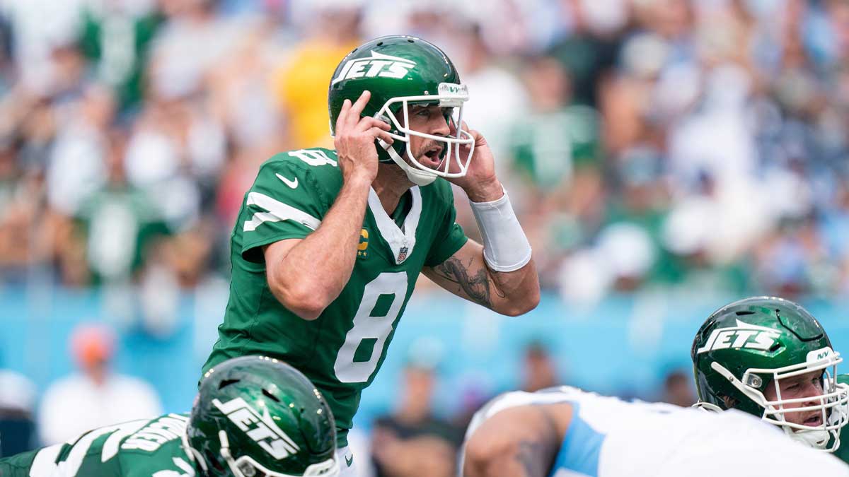 New York Jets quarterback Aaron Rodgers (8) calls a play against the Tennessee Titans during their game at Nissan Stadium in Nashville, Tenn., Sunday, Sept. 15, 2024.