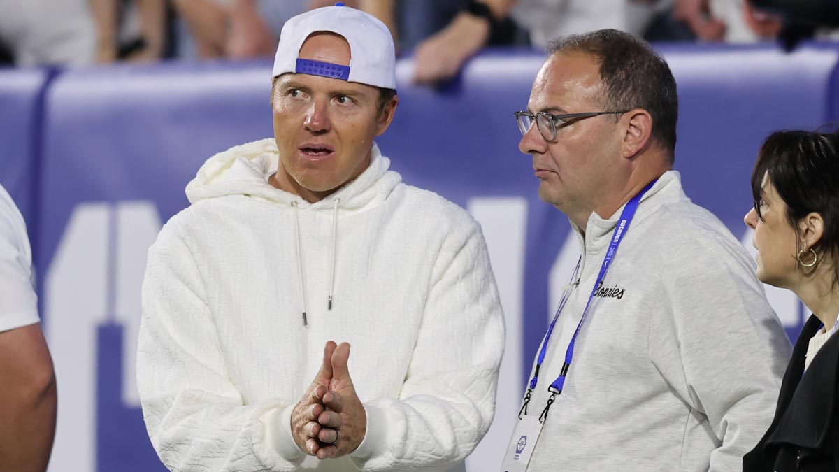 Brigham Young Cougars alumni and Utah Jazz owner Ryan Smith speaks with Adrian Wojnarowski in the game against the Kansas State Wildcats at LaVell Edwards Stadium.