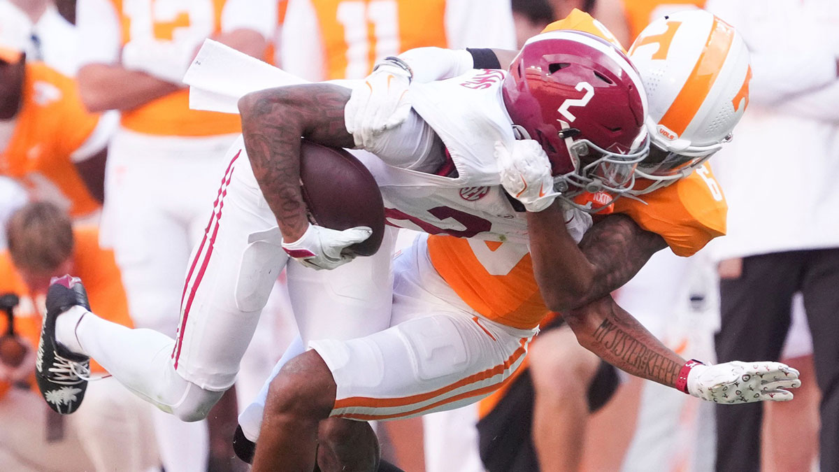 Tennessee defensive back Jalen McMurray (6) pulls down Alabama wide receiver Ryan Williams (2) during their game at Neyland Stadium on Saturday, Oct. 19, 2024, in Knoxville. Tenn.