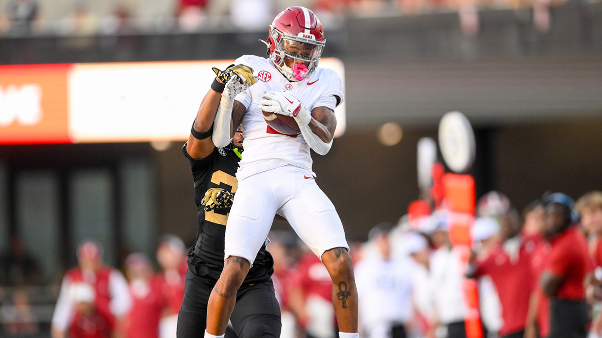 ; Alabama Crimson Tide wide receiver Ryan Williams (2) makes a catch over Vanderbilt Commodores cornerback Jaylin Lackey (27) during the second half at FirstBank Stadium