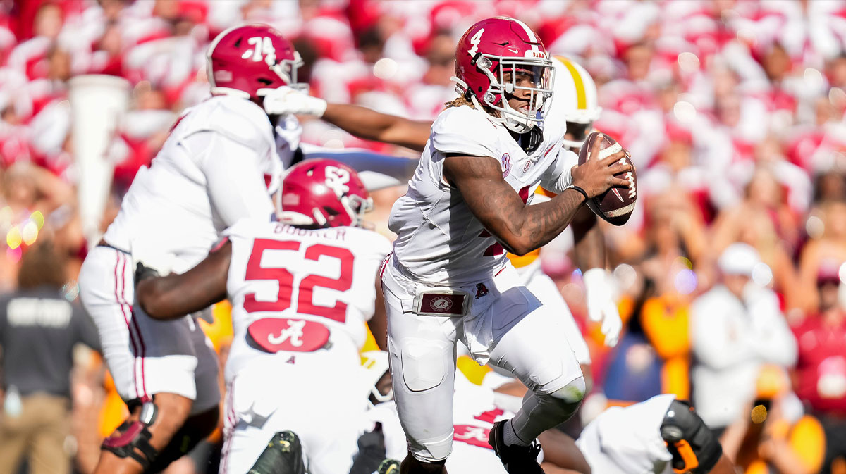 Alabama quarterback Jalen Milroe (4) scrambles during an SEC conference game between Tennessee and Alabama in Neyland Stadium on Saturday, Oct. 19, 2024.