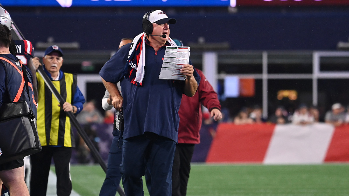 New England Patriots offensive coordinator Alex Van Pelt works on the sideline during the first half against the Carolina Panthers at Gillette Stadium.