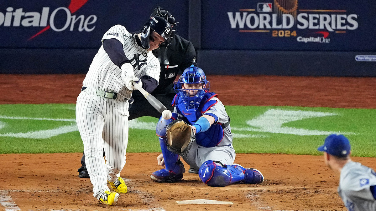 New York Yankees outfielder Alex Verdugo (24) hits an RBI single during the second inning against the Los Angeles Dodgers in game four of the 2024 MLB World Series at Yankee Stadium.