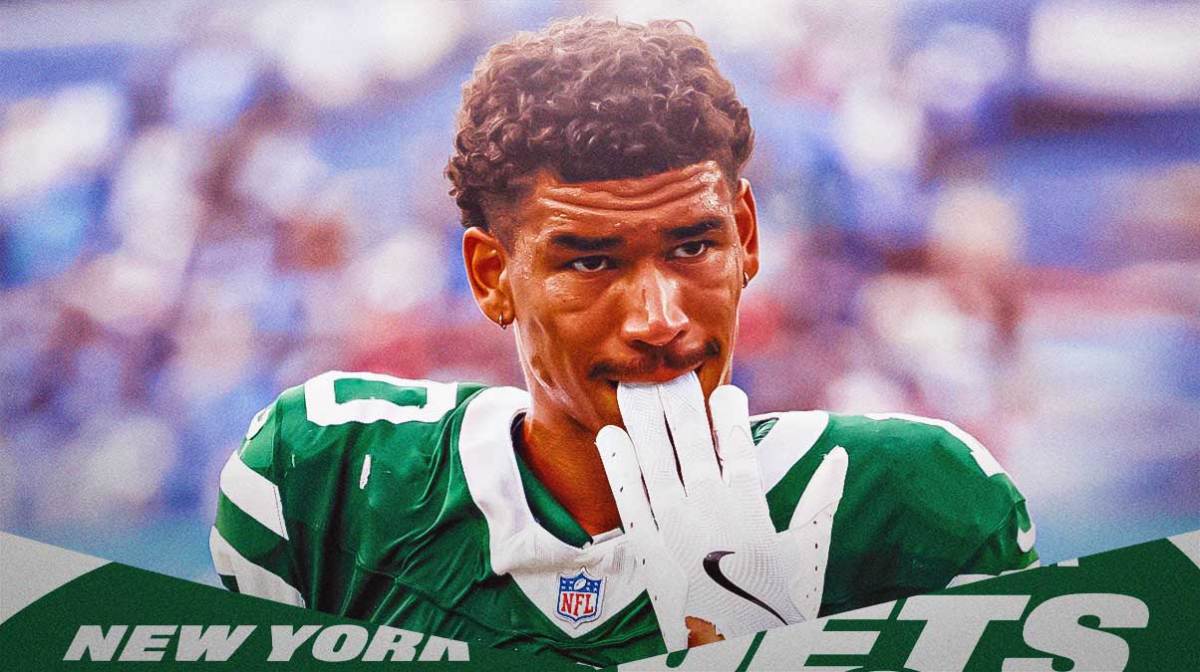 Allen Lazard in a New York Jets uniform looking unhappy as he was flagged for a finger gun celebration similar to drake london's finger gun penalty as the jets committed more penalties sunday.