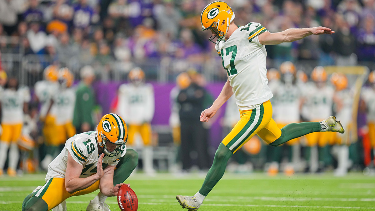 Dec 31, 2023; Minneapolis, Minnesota, USA; Green Bay Packers place kicker Anders Carlson (17) kicks a field goal against the Minnesota Vikings in the first quarter at U.S. Bank Stadium.