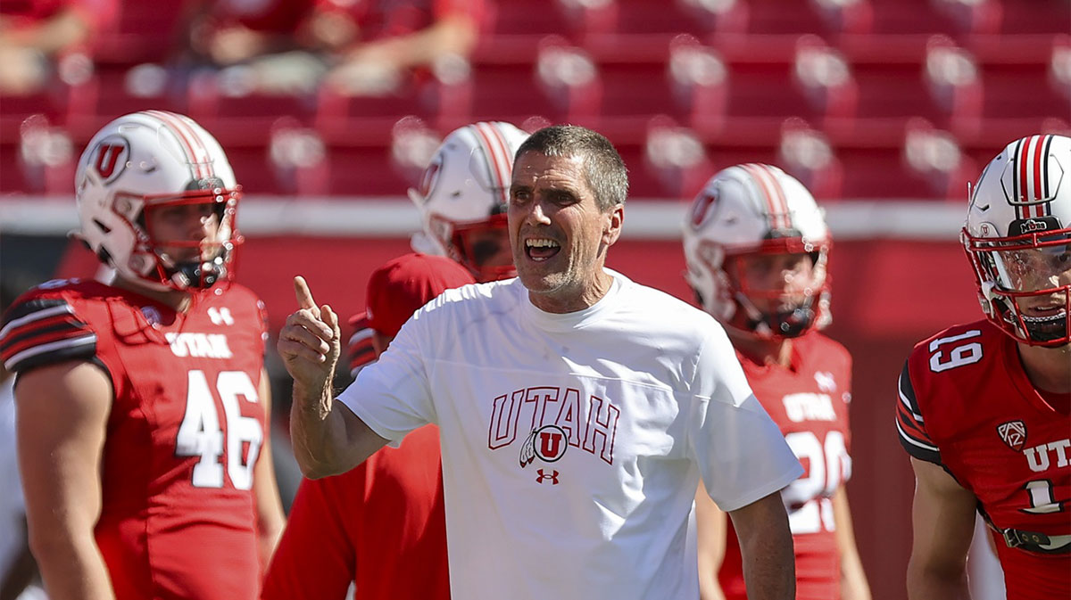 Utah Utes offensive coordinator Andy Ludwig prepares his team before a game against the Weber State Wildcats at Rice-Eccles Stadium.