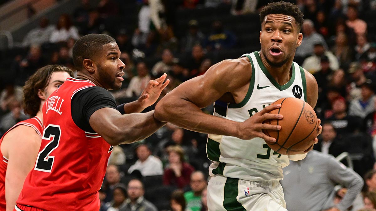 Milwaukee Bucks forward Giannis Antetokounmpo (34) drives past Chicago Bulls forward E.J. Liddell (32) in the third quarter at Fiserv Forum.
