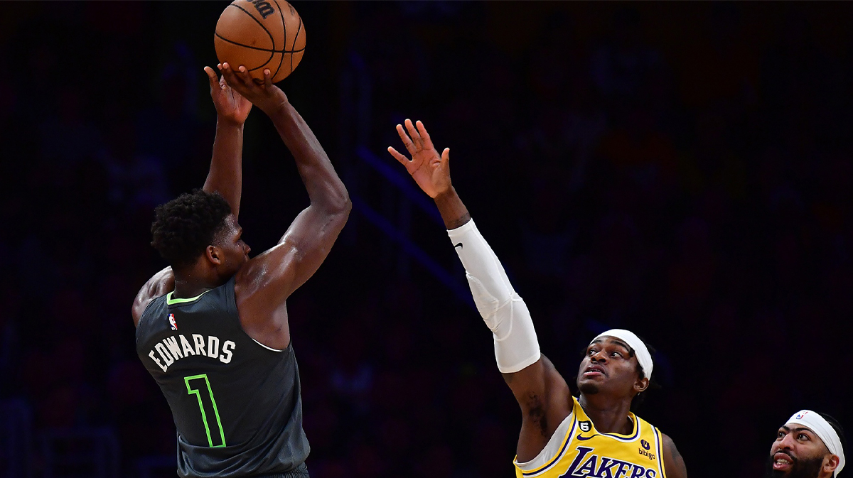 Minnesota Timberwolves guard Anthony Edwards (1) shoots against Los Angeles Lakers forward Jared Vanderbilt (2) during the first half at Crypto.com Arena.