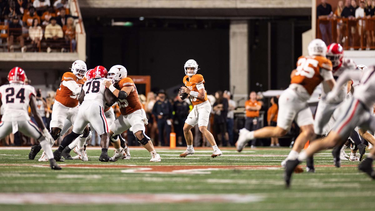 Texas Longhorns quarterback Arch Manning (16) drops back to pass in the second quarter against the Georgia Bulldogs at Darrell K Royal-Texas Memorial Stadium.