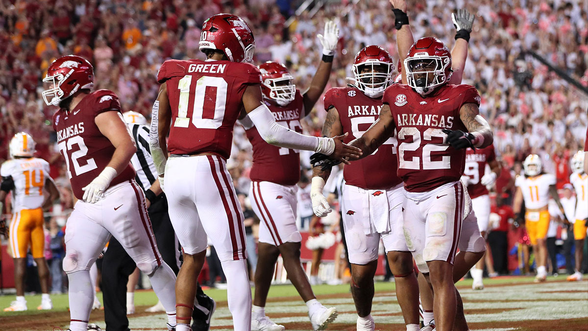 Arkansas Razorbacks running back Ja’Quinden Jackson (22) celebrates with quarterback Taylen Green (10) after scoring in the third quarter against the Tennessee Volunteers at Donald W. Reynolds Razorback Stadium. Arkansas won 19-14