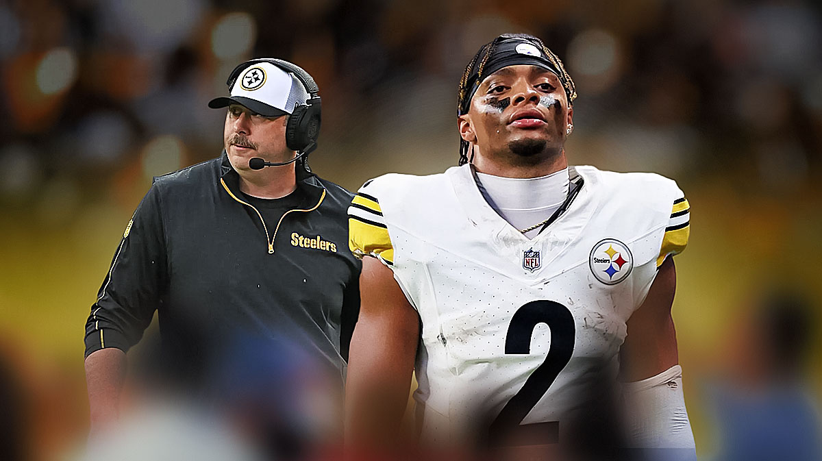 Justin Fields in a Pittsburgh Steelers uniform with Steelers offensive coordinator Arthur Smith in the background as Smith praises Fields amid Russell Wilson controversy.