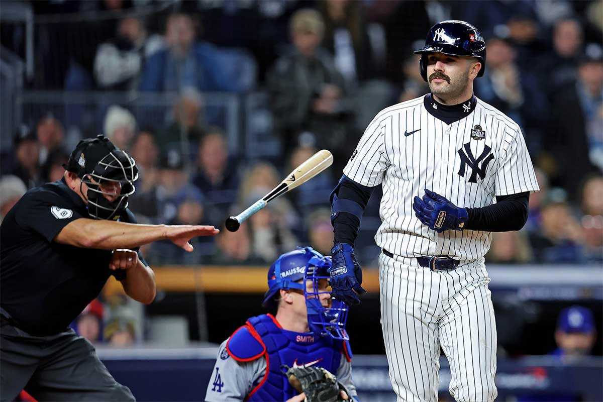 Oct 28, 2024; New York, New York, USA; New York Yankees catcher Austin Wells (28) reacts after striking out but thinking he walked during the seventh inning against the Los Angeles Dodgers in game three of the 2024 MLB World Series at Yankee Stadium.