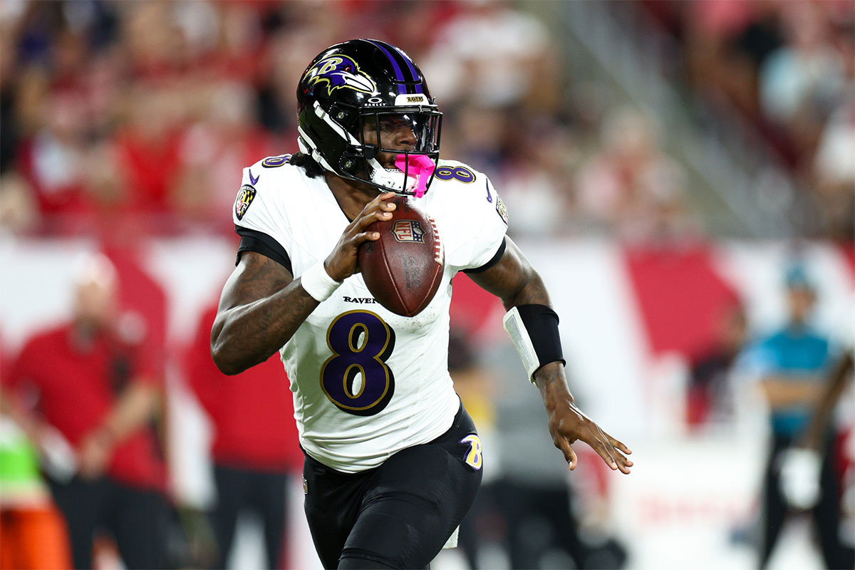 Baltimore Ravens quarterback Lamar Jackson (8) drops back to pass against the Tampa Bay Buccaneers in the second quarter at Raymond James Stadium.