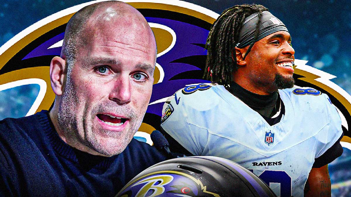 Baltimore Ravens general manager Eric DeCosta with wide receiver Diontae Johnson in a Ravens uniform. There is also a logo for the Baltimore Ravens.