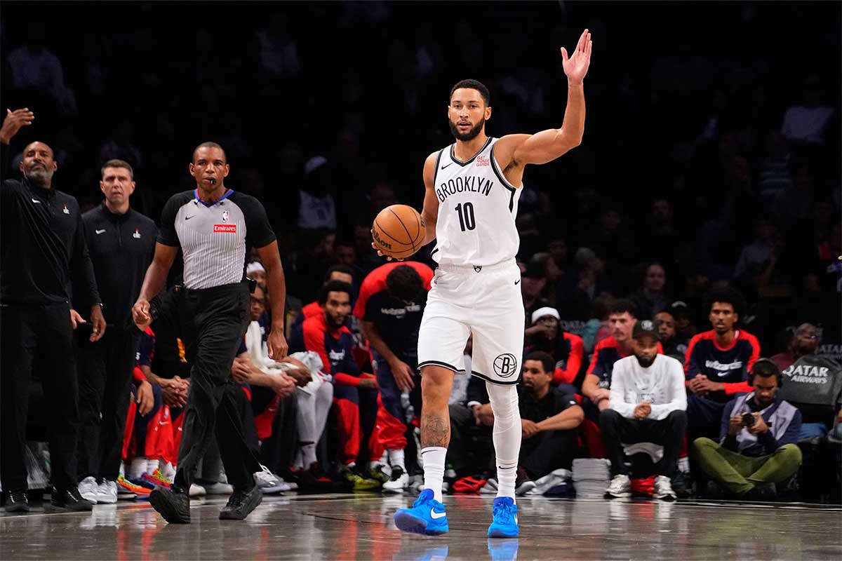 Brooklyn Nets point guard Ben Simmons (10) signals to his teammates during the first half against the Washington Wizards at Barclays Center.