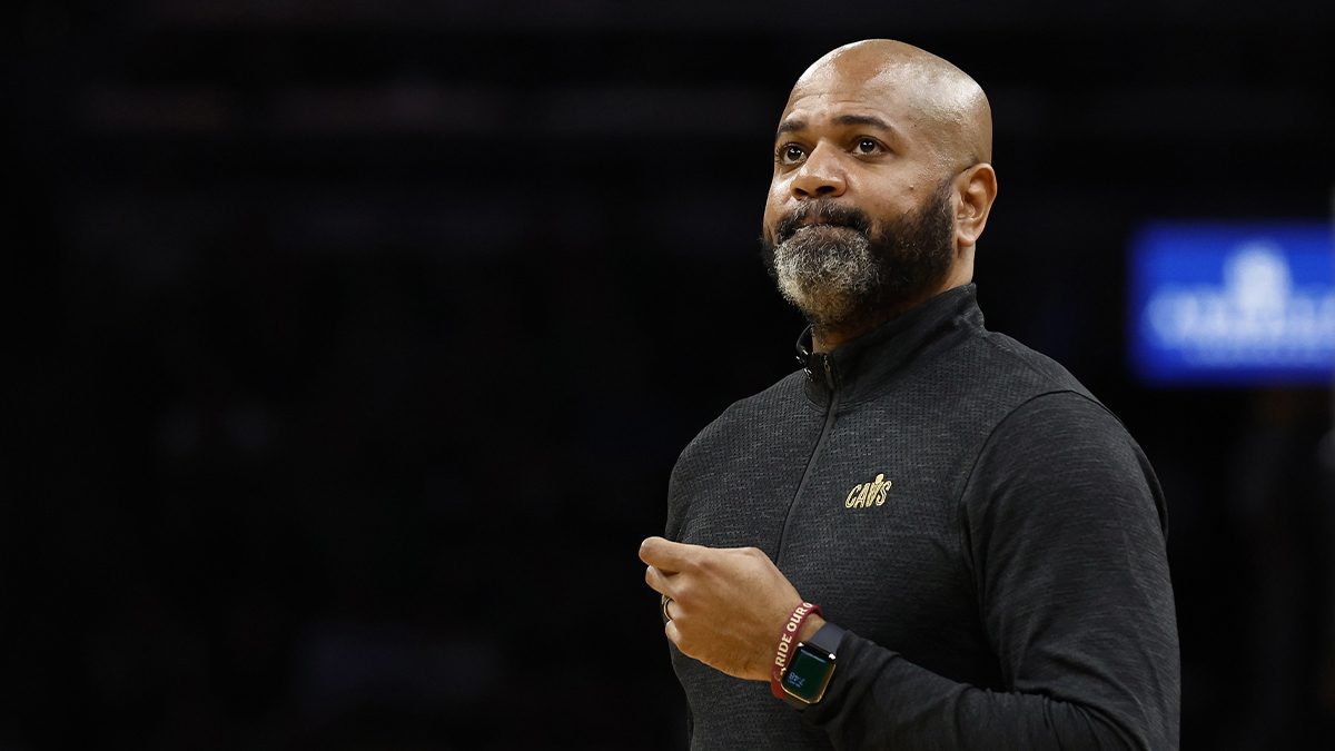 Cleveland Cavaliers head coach J.B. Bickerstaff checks the scoreboard during a timeout in the second quarter of game one of the second round of the 2024 NBA playoffs against the Boston Celtics at TD Garden.