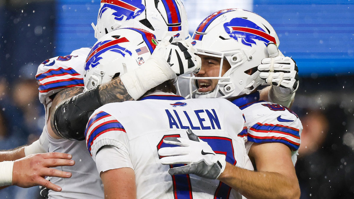 Buffalo Bills tight end Dalton Kincaid (86) celebrates with quarterback Josh Allen (17) after catching a touchdown pass against the Seattle Seahawks during the second quarter at Lumen Field.