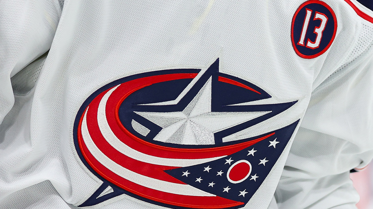 A patch honoring the life Johnny Gaudreau is seen on the jersey worn by Columbus Blue Jackets right wing Yegor Chinakhov (59) during the first period at Xcel Energy Center.