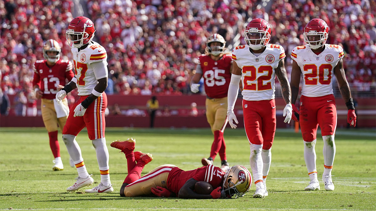 San Francisco 49ers wide receiver Brandon Aiyuk (11) lays on the ground after suffering an injury against the Kansas City Chiefs in the second quarter at Levi's Stadium.