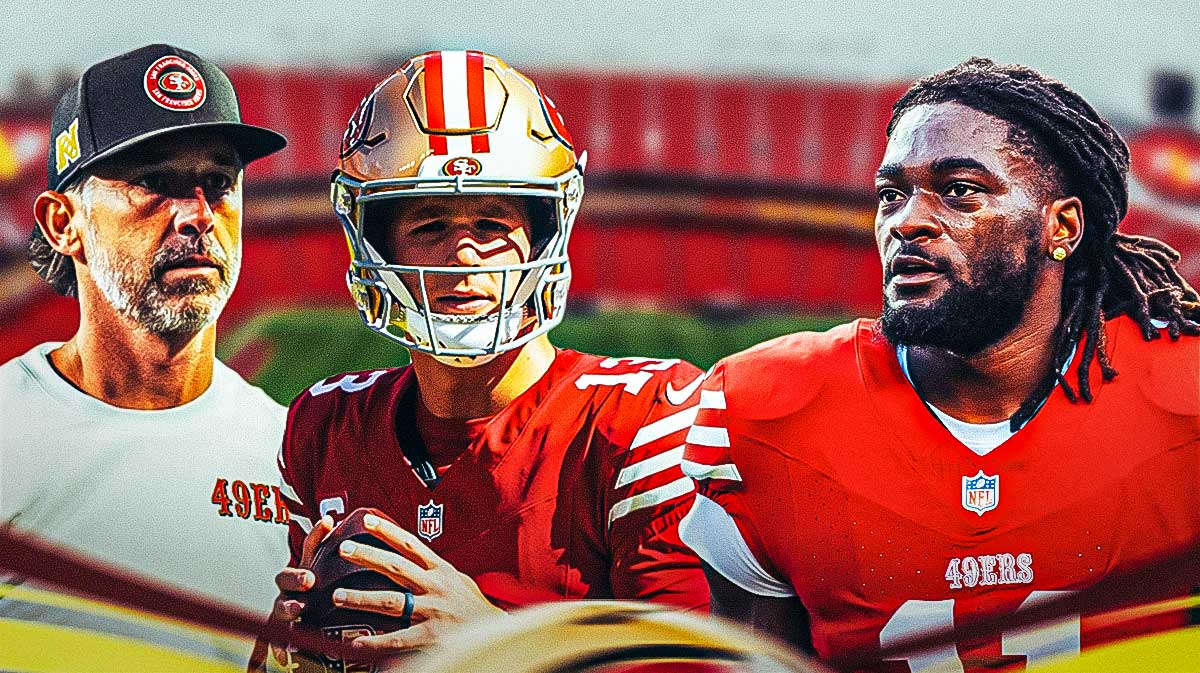 Kyle Shanahn and Brock Purdy looking sad at Brandon Aiyuk