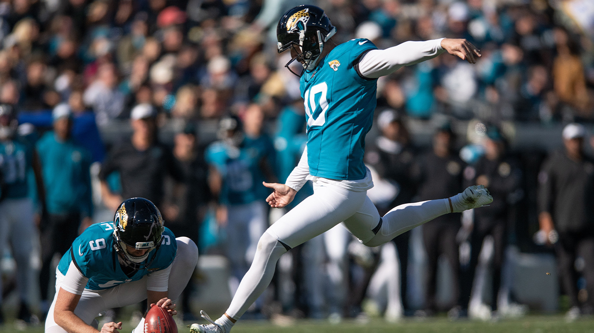 Dec 31, 2023; Jacksonville, Florida, USA; Jacksonville Jaguars punter Logan Cooke (9) holds the ball andnkicker Brandon McManus (10) make the field goal against the Carolina Panthers in the second quarter at EverBank Stadium. 