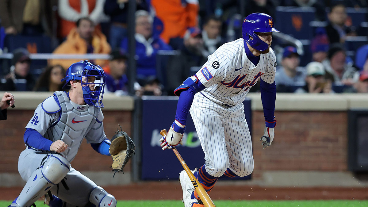 New York Mets outfielder Brandon Nimmo (9) hits into a RBI fielders choice against the Los Angeles Dodgers in the third inning during game four of the NLCS for the 2024 MLB playoffs at Citi Field.