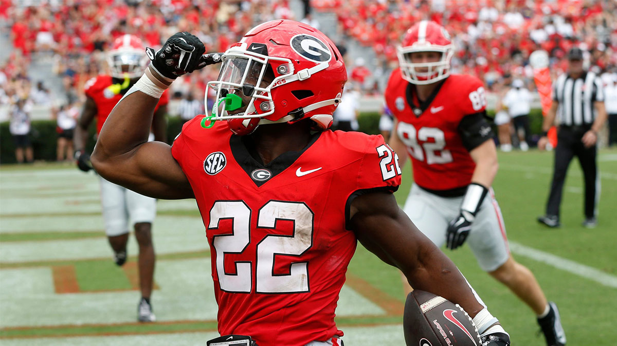Georgia running back Branson Robinson (22) celebrates after scoring a touchdown during the second half of a NCAA Aflac Kickoff game against Tennessee Tech in Athens, Ga., on Saturday, Sept. 7, 2024.