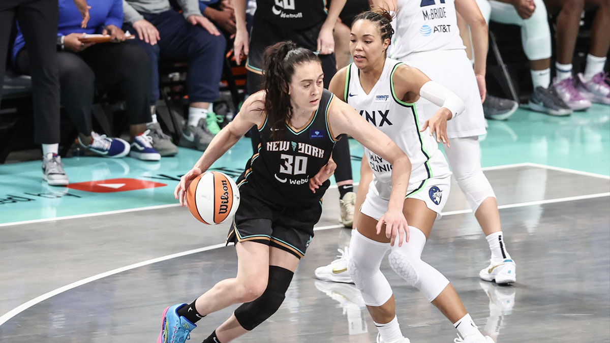 New York Liberty forward Breanna Stewart (30) controls the ball as Minnesota Lynx forward Napheesa Collier (24) defends in overtime at Barclays Center.