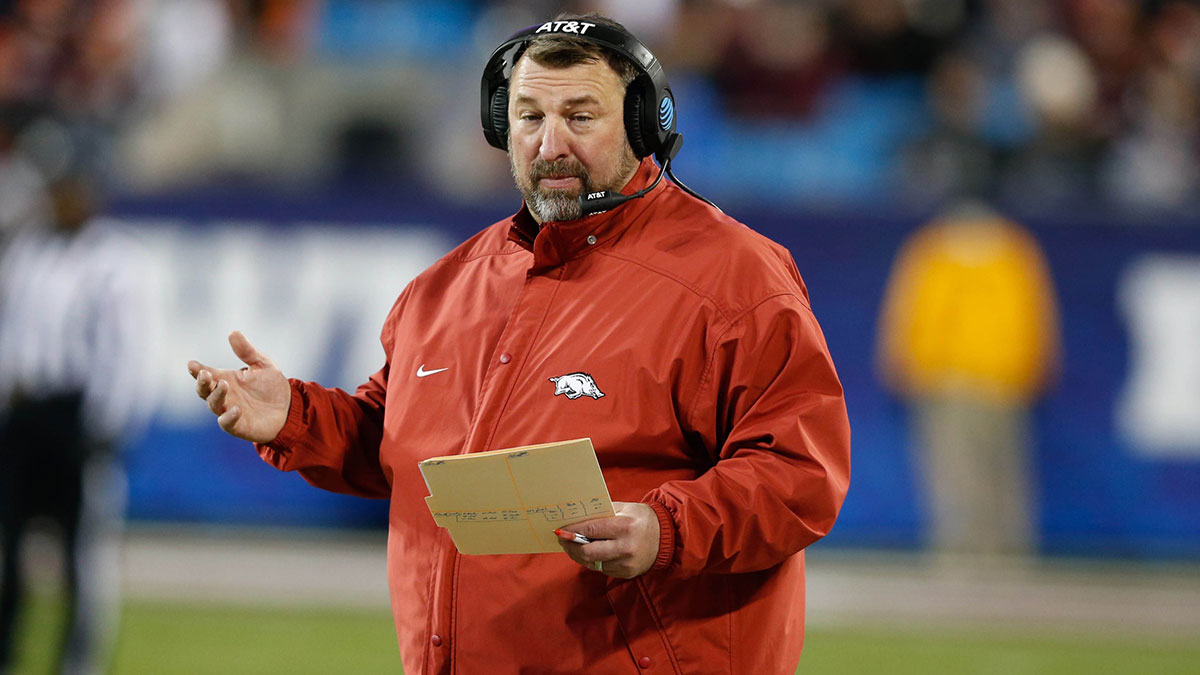 Arkansas Razorbacks head coach Brett Bielema stands on the sidelines during the first quarter against the Virginia Tech Hokies during the Belk Bowl at Bank of America Stadium.