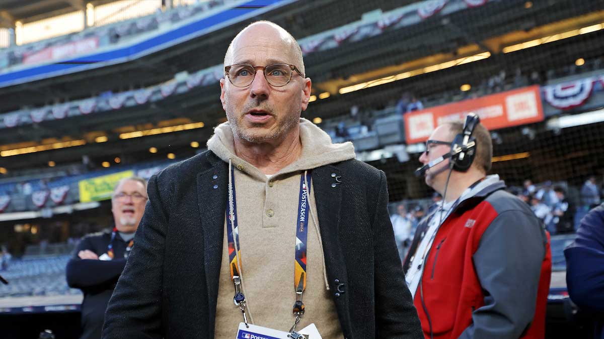 New York Yankees general manager Brian Cashman walks on the field before game three of the 2024 MLB World Series between the New York Yankees and the Los Angeles Dodgers at Yankee Stadium. 