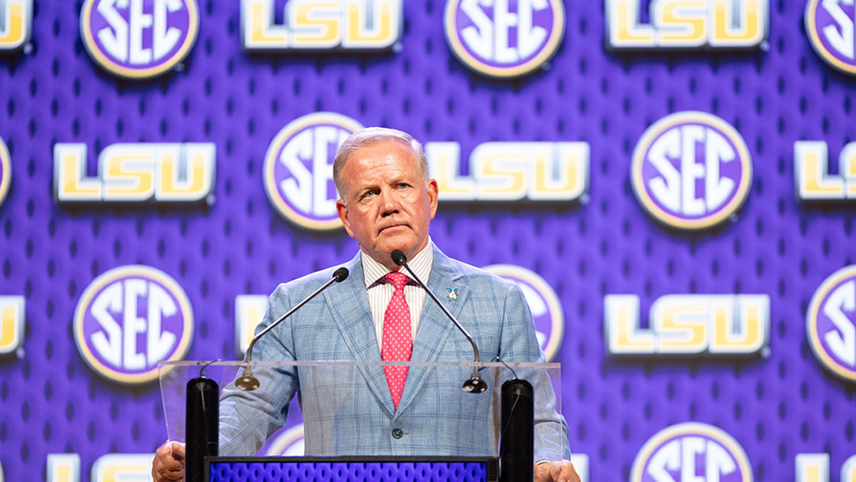 LSU head coach Brian Kelly speaking at Omni Dallas Hotel.