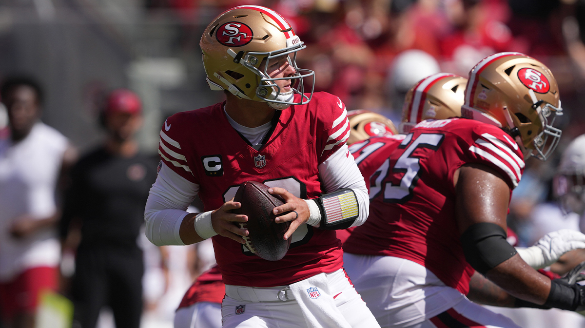 San Francisco 49ers quarterback Brock Purdy (13) drops back to pass against the Arizona Cardinals during the first quarter at Levi's Stadium.