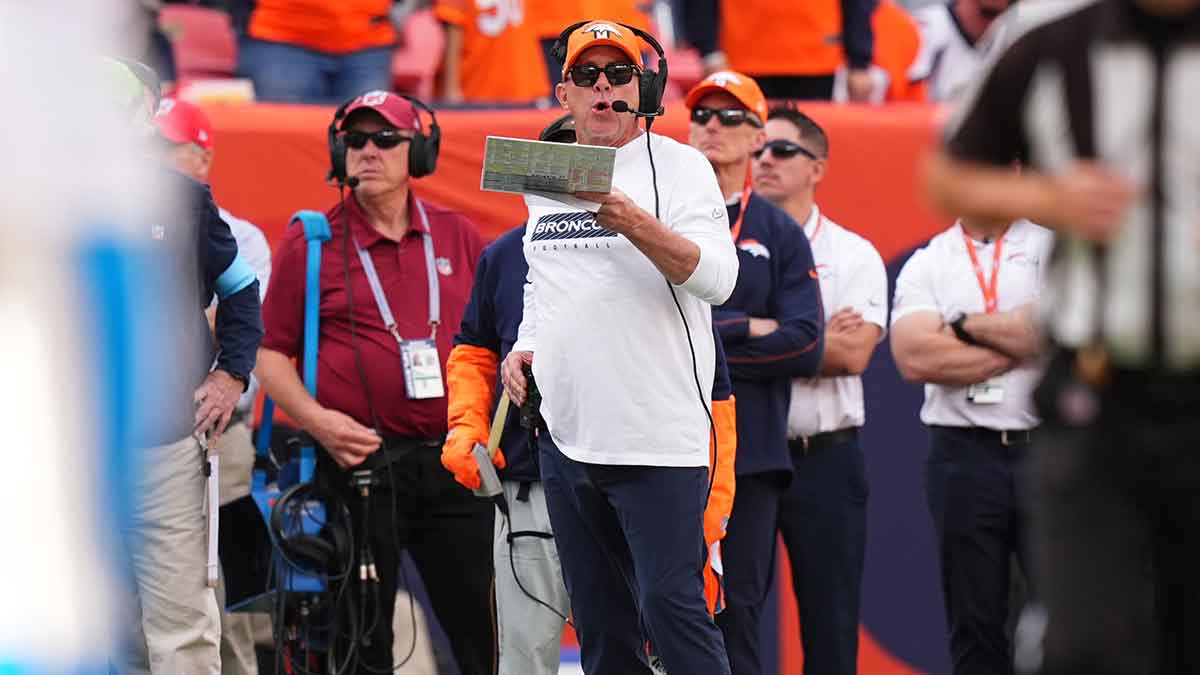 Denver Broncos head coach Sean Payton calls plays during the second quarter against the Carolina Panthers at Empower Field at Mile High