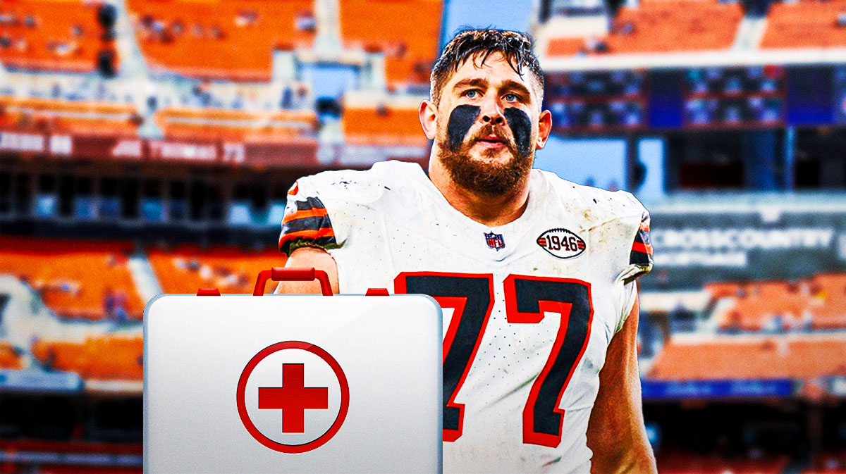 Cleveland Browns guard Wyatt Teller in center, injury/health sign next to him, Huntingdon Bank Field (home field of the Cleveland Browns) in background