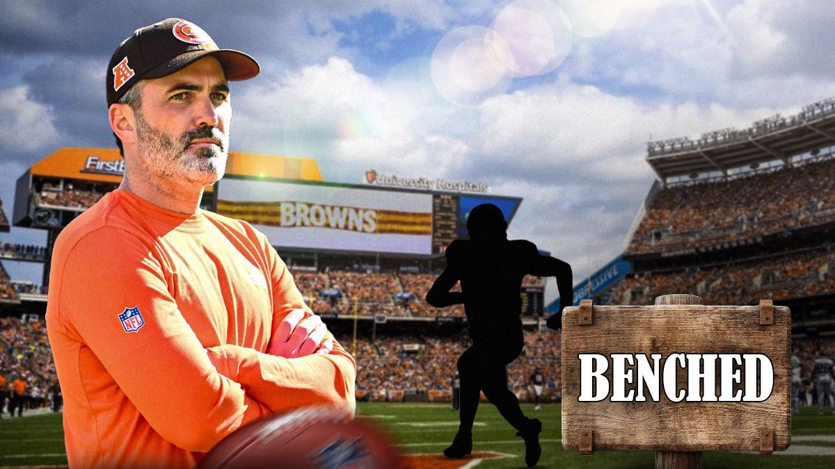 Browns' Kevin Stefanski next to blacked out player silhouette and sign that says BENCHED