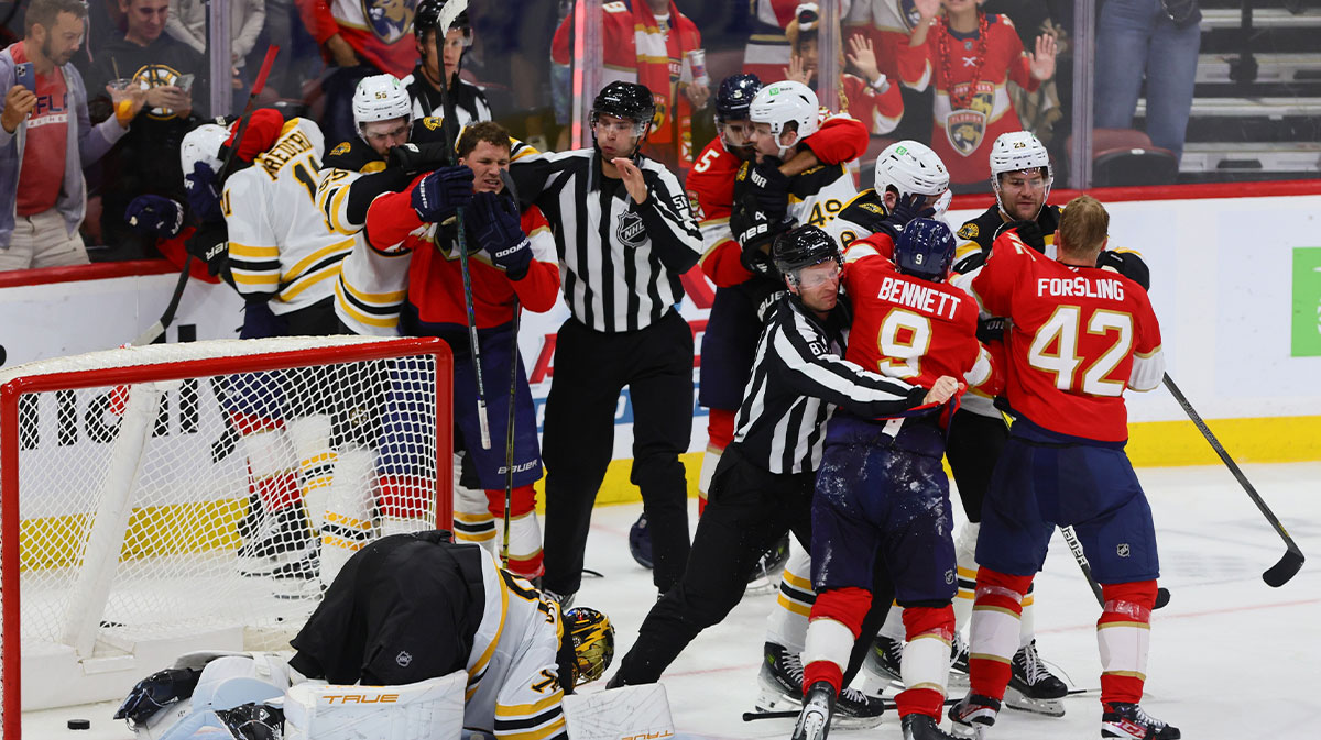 Florida Panthers and Boston Bruins players fight during the third period at Amerant Bank Arena.